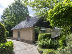 Cozy house with fireplace and garden in the forest